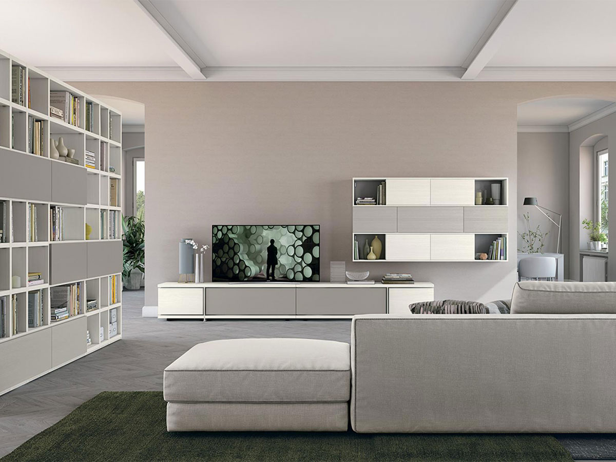 Soggiorno con libreria living arredamento mobili for Arredamento soggiorno immagini