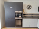 Cucina Angolare con Penisola e Top in Quarzo