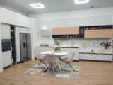 Cucina con Isola e Zona Living Integrata